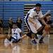 Lincoln sophomore Tyler Mabry grabs a loose ball on Tuesday, Jan. 29. Daniel Brenner I AnnArbor.com